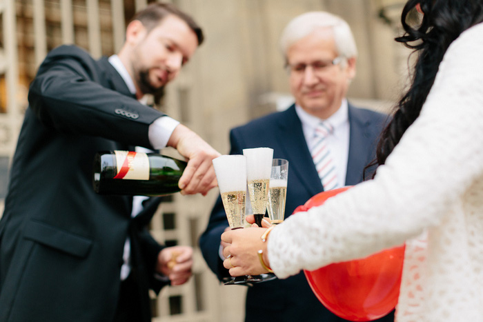 pouring champagne in the street