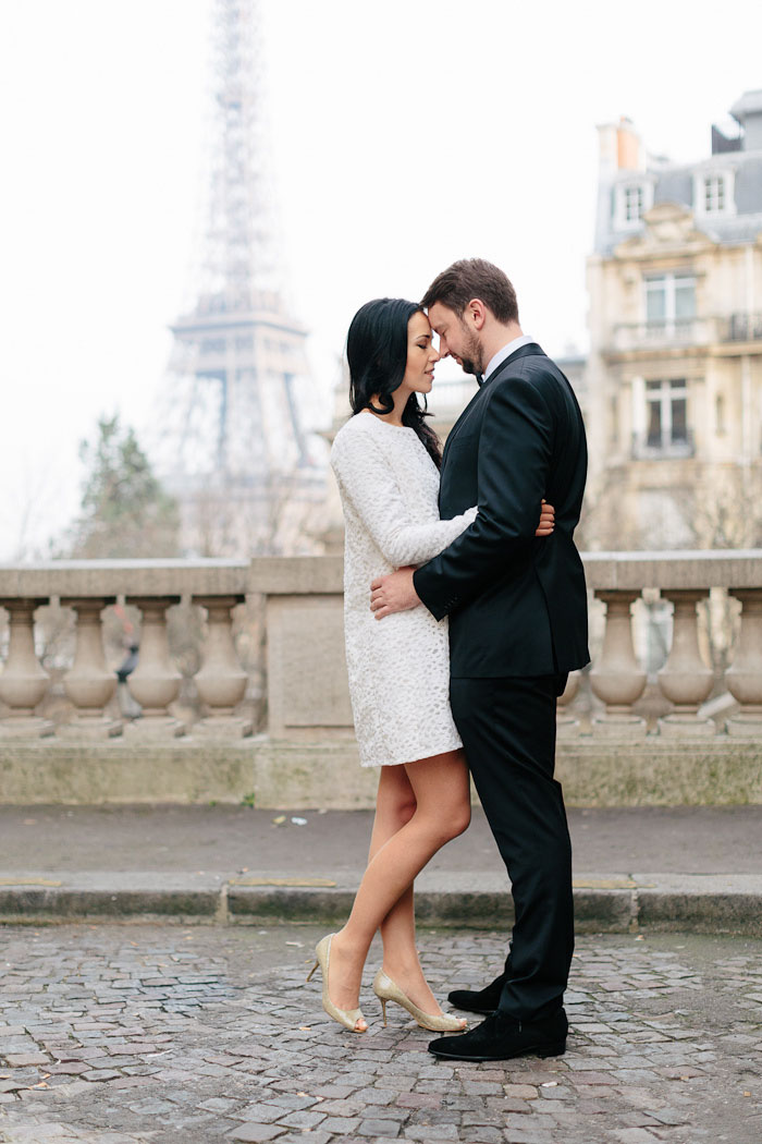 bride and groom portrait in front of eiffel tower