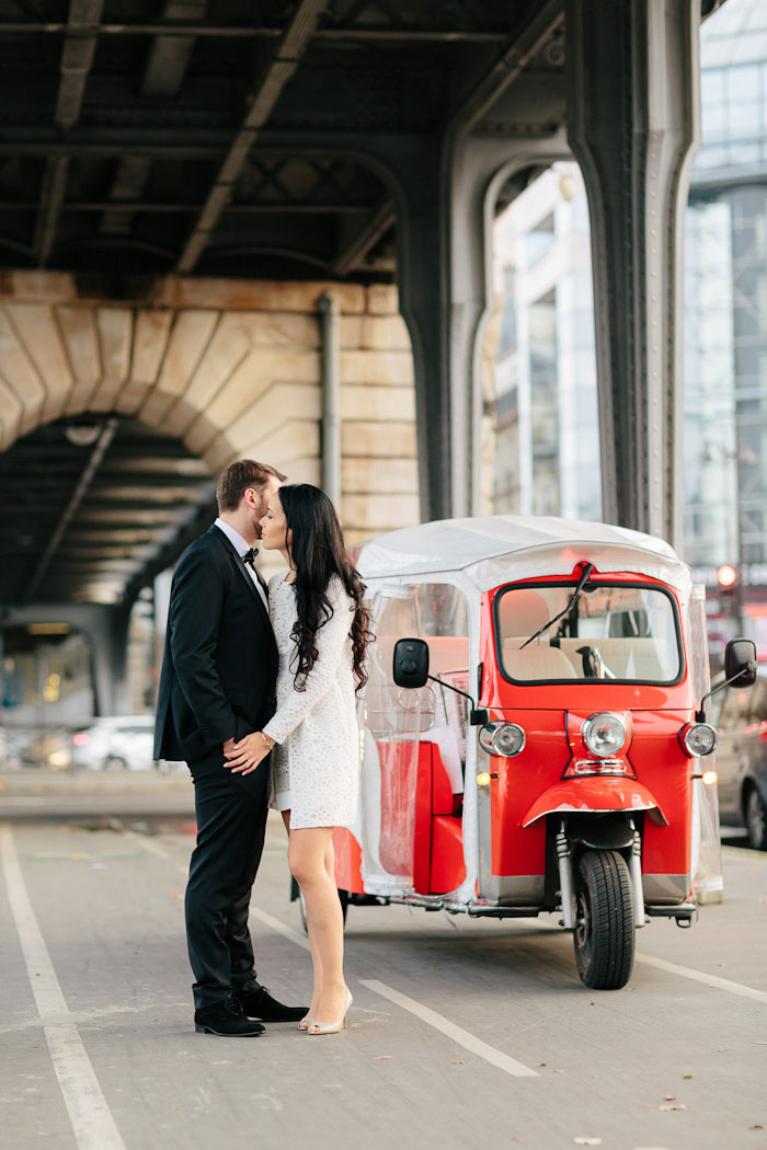 bride and groom portrait with covered scooter