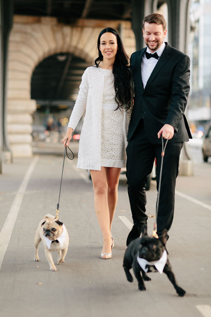 bride and groom walking dogs in Paris