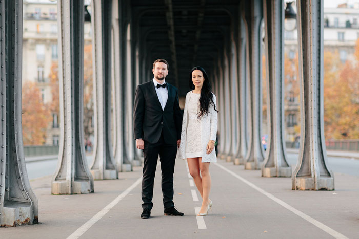 bride and groom walking in Paris