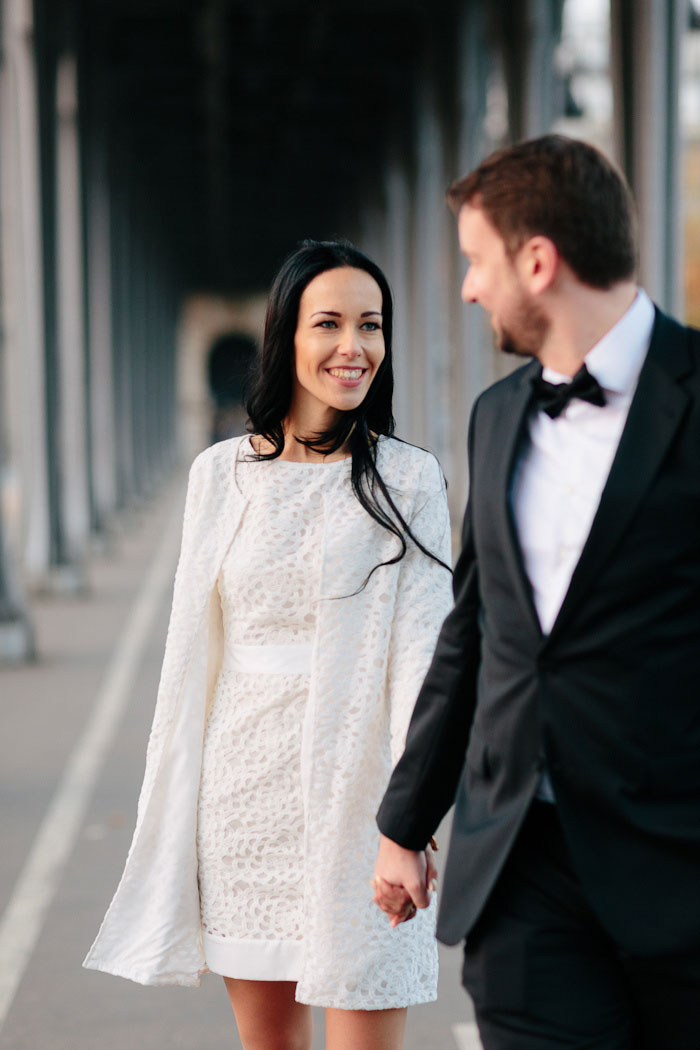bride and groom walking in Paris