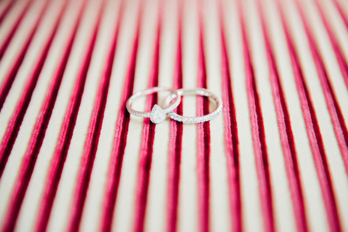 wedding rings on striped fabric