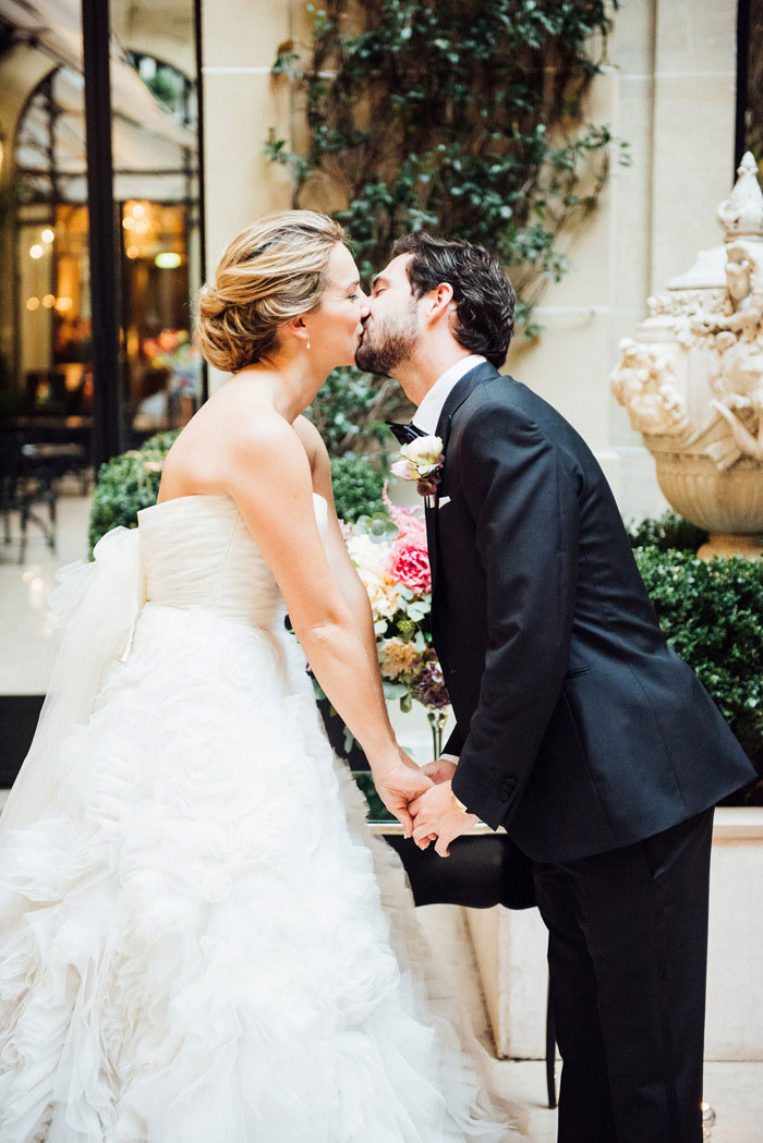 bride and groom first kiss