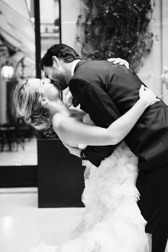 bride and groom first kiss