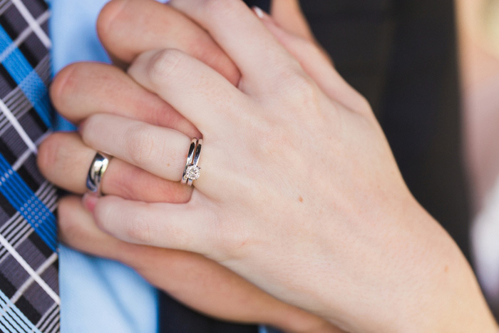 bride and groom hands intertwined