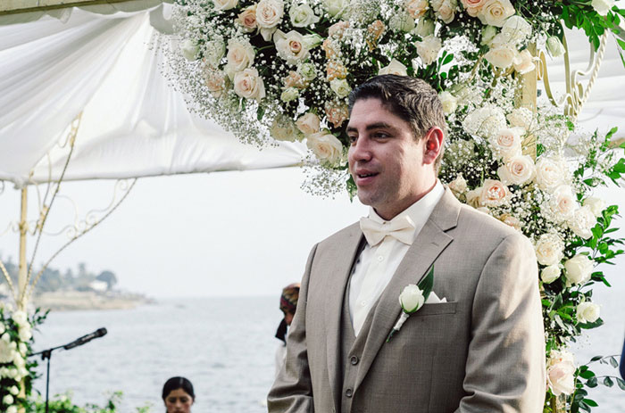 groom waiting at the altar