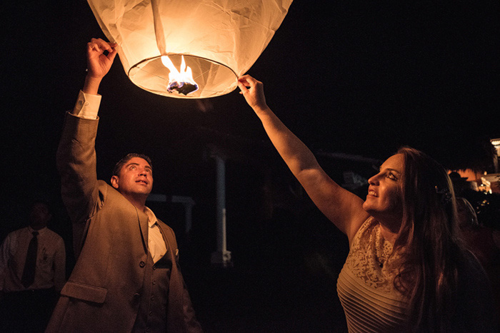 bride and groom releasing wish lantern