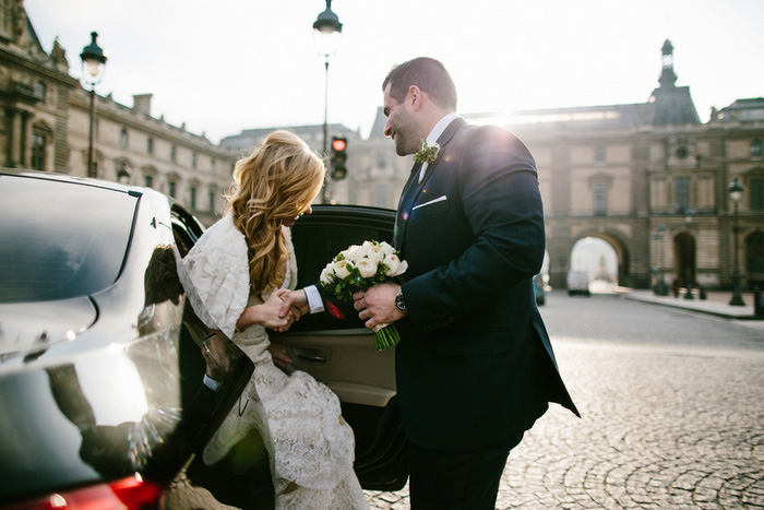 bride and groom getting out of car