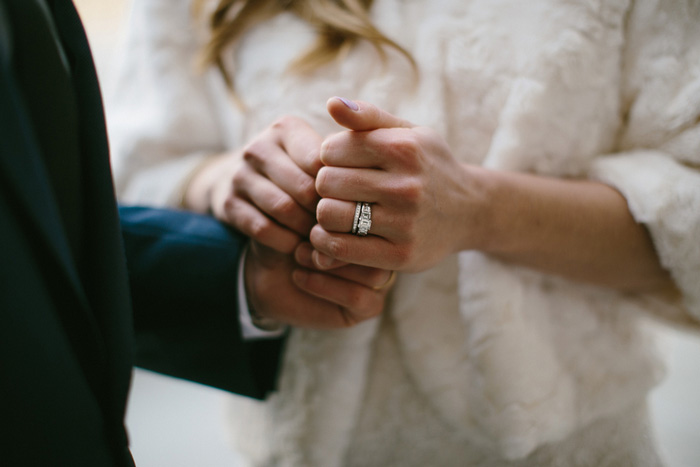 Bride and groom holding hands