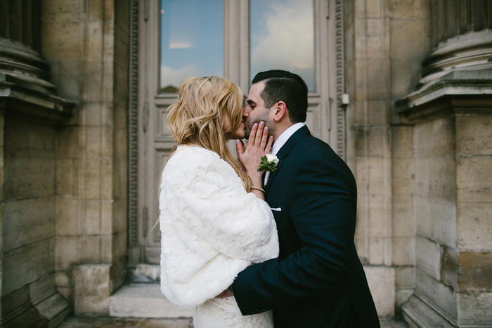 Bride and groom kising