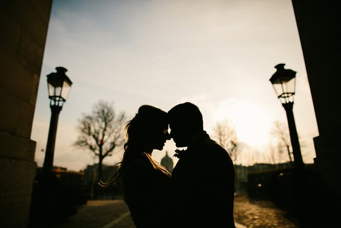 bride and groom silhouette at sunset