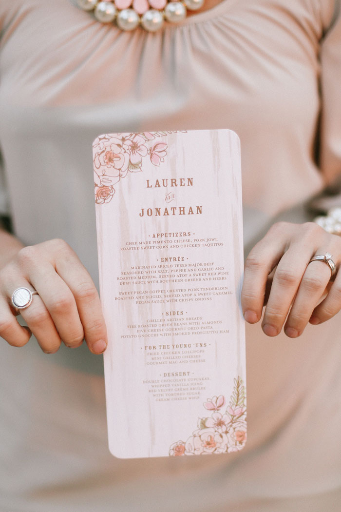 guest holding wedding menu