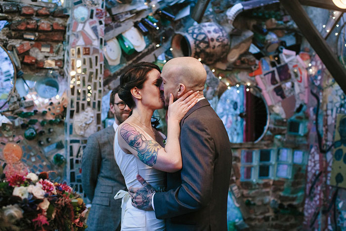 bride and groom first kiss