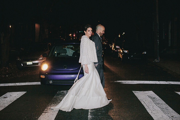 bride and groom crossing the street