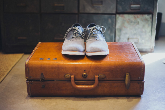 groom's shoeson suitcase