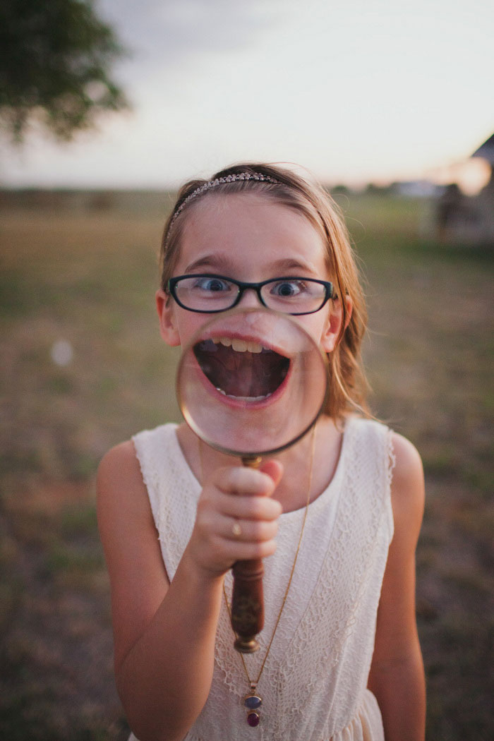 portrait with magnifying glass