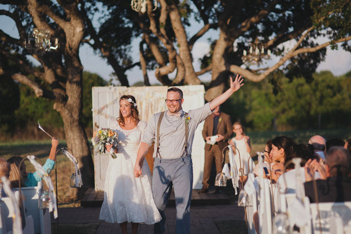 bride and groom walking down the aisle