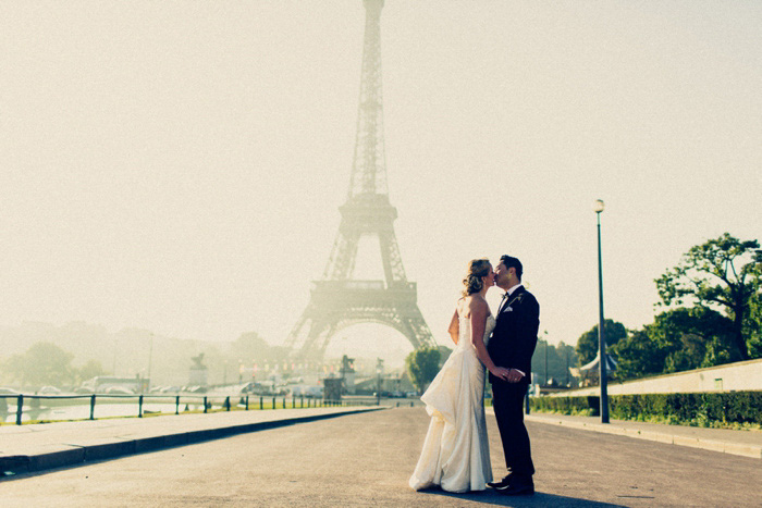 bride and groom portrait in front of Eiffel Tower