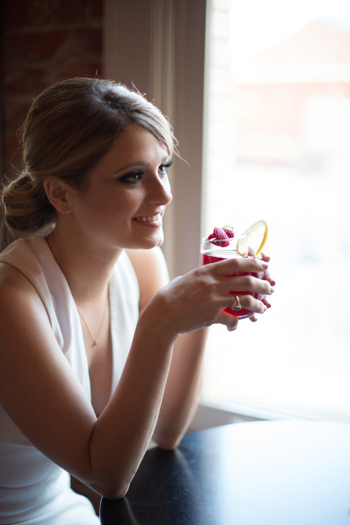 bride drinking cocktail