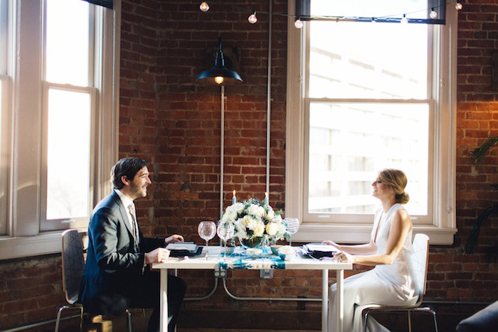 bride and groom at elopement dinner