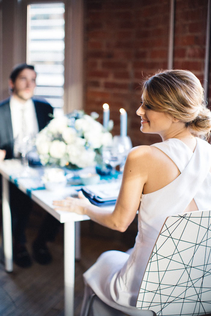 bride sitting at dinner table