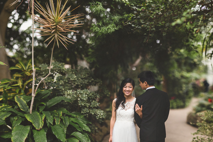 bride and groom portrait in conservatory