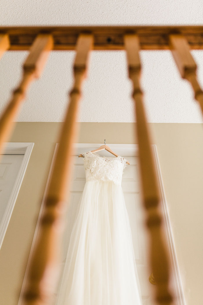 wedding dress hanging up