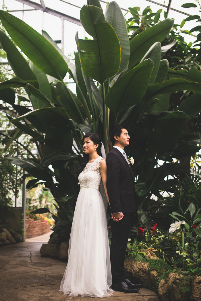 bride and groom back to back potrait