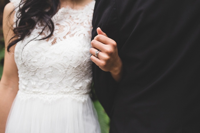 bride and groom linking arms