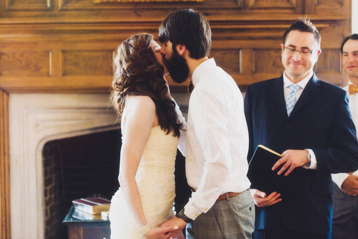 bride and groom first kiss