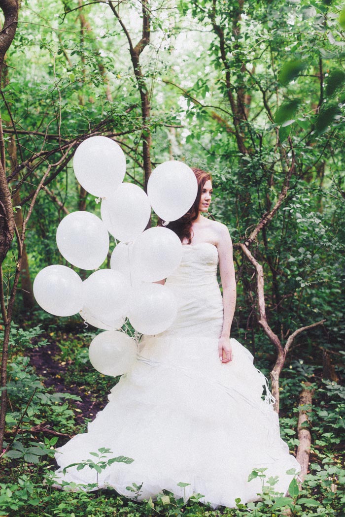 bride with white balloons