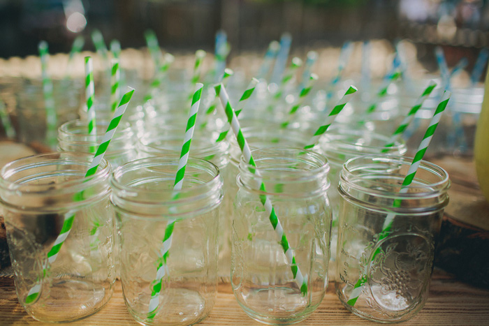 mason jars with green striped straws