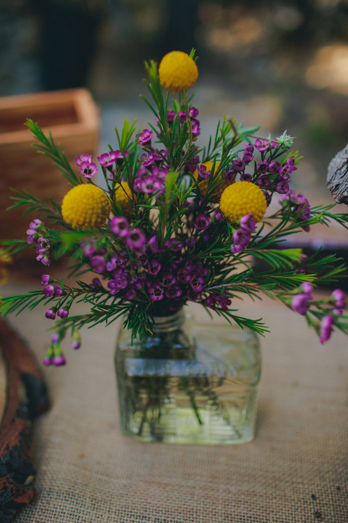 purple and yellow flower cnterpiece