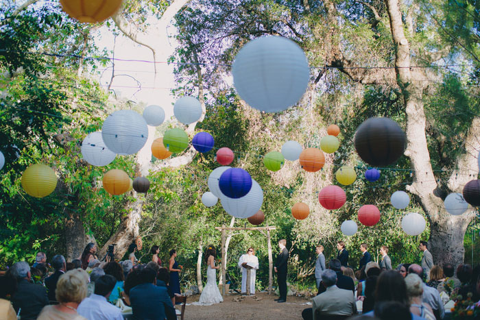 outdoor wedding ceremony set-up with paper lanterns