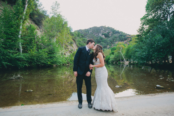 bride and groom kissing