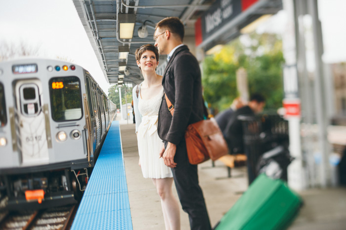 bride and groom waiting for the subway