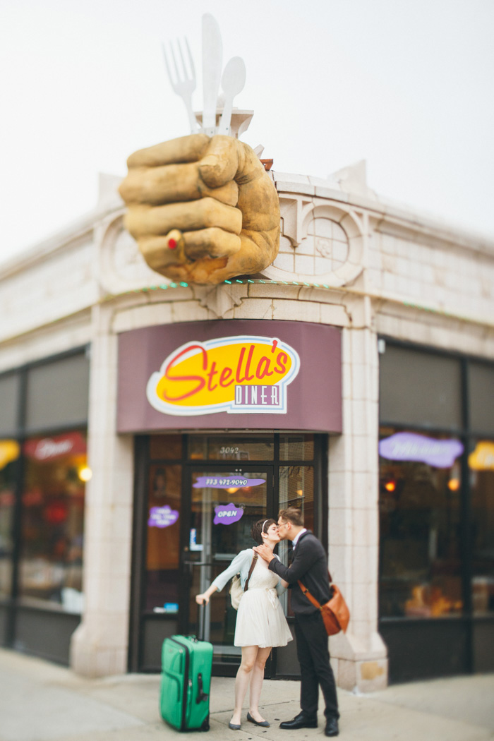 bride and groom in front of diner