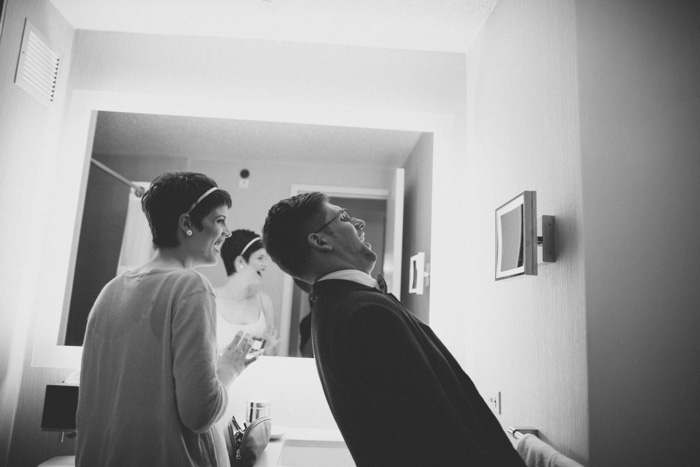 bride and groom getting ready