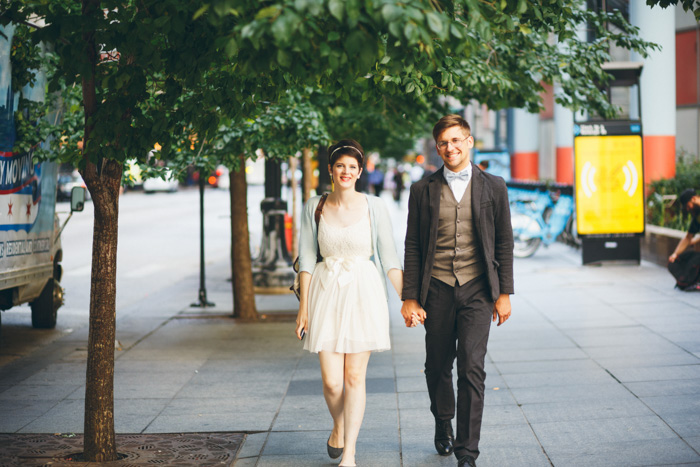 bride and groom walking down the street