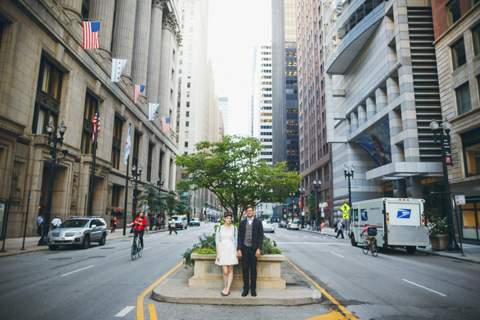 bride and groom portrait on traffic island