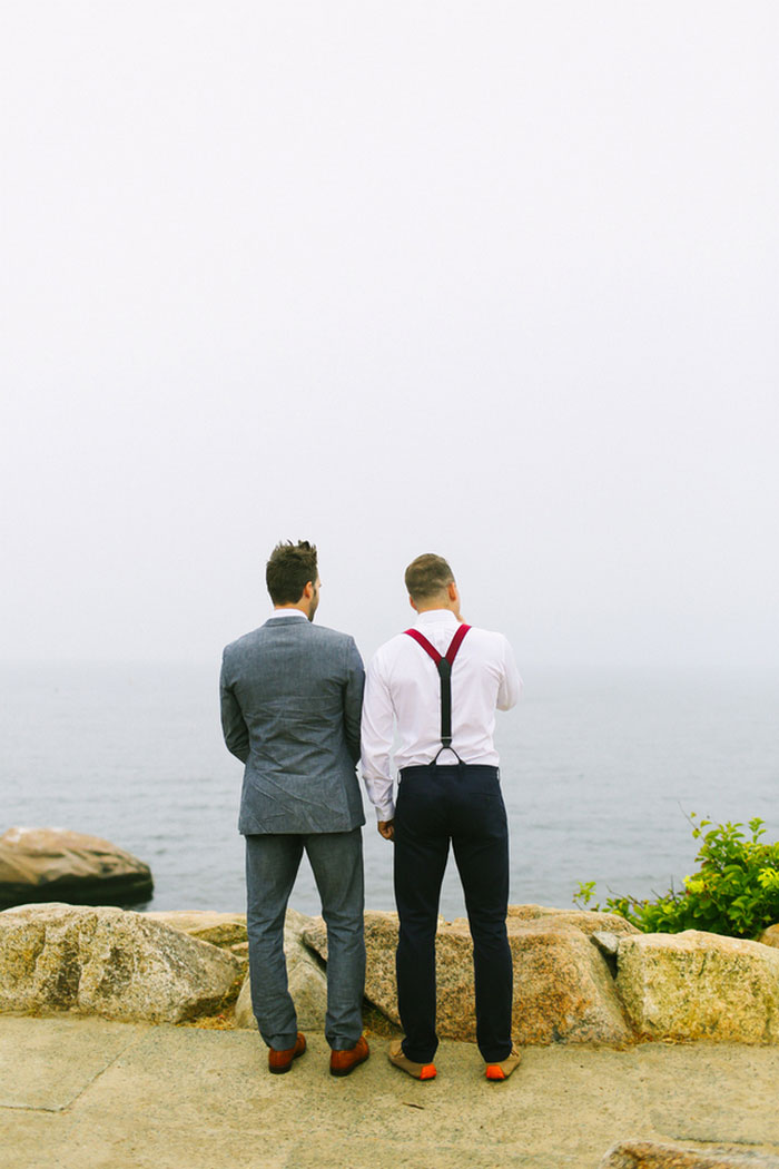 groom and best man waiting by the sea