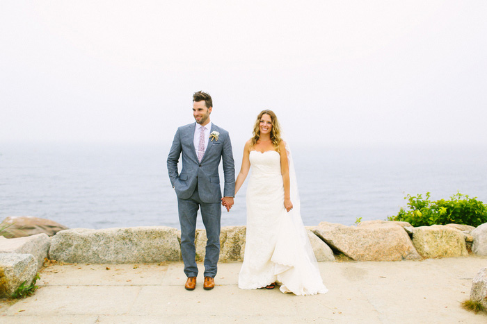 bride and and groom portrait by the sea