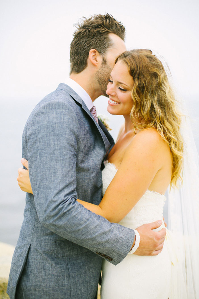 bride and groom embracing