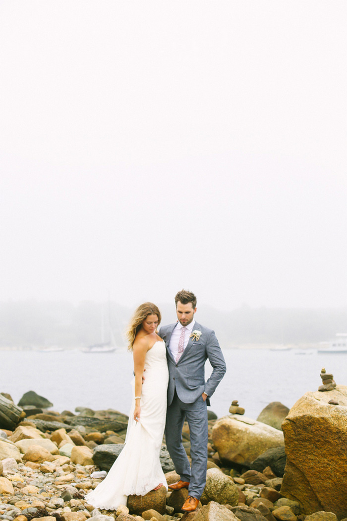 bride and and groom portrait by the sea