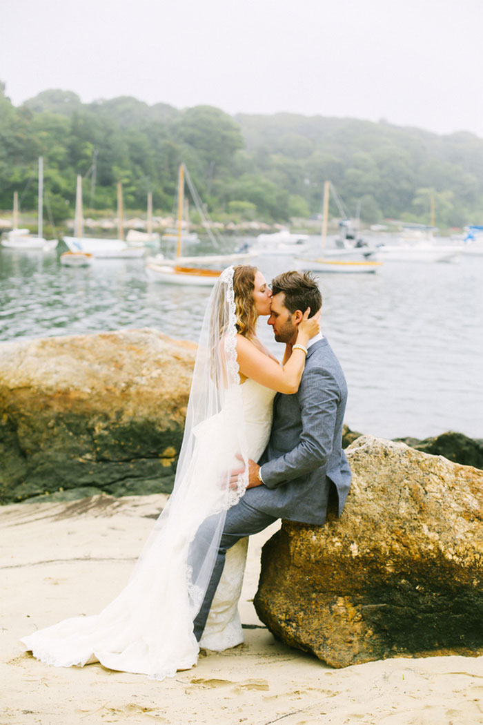 bride and and groom portrait by the sea