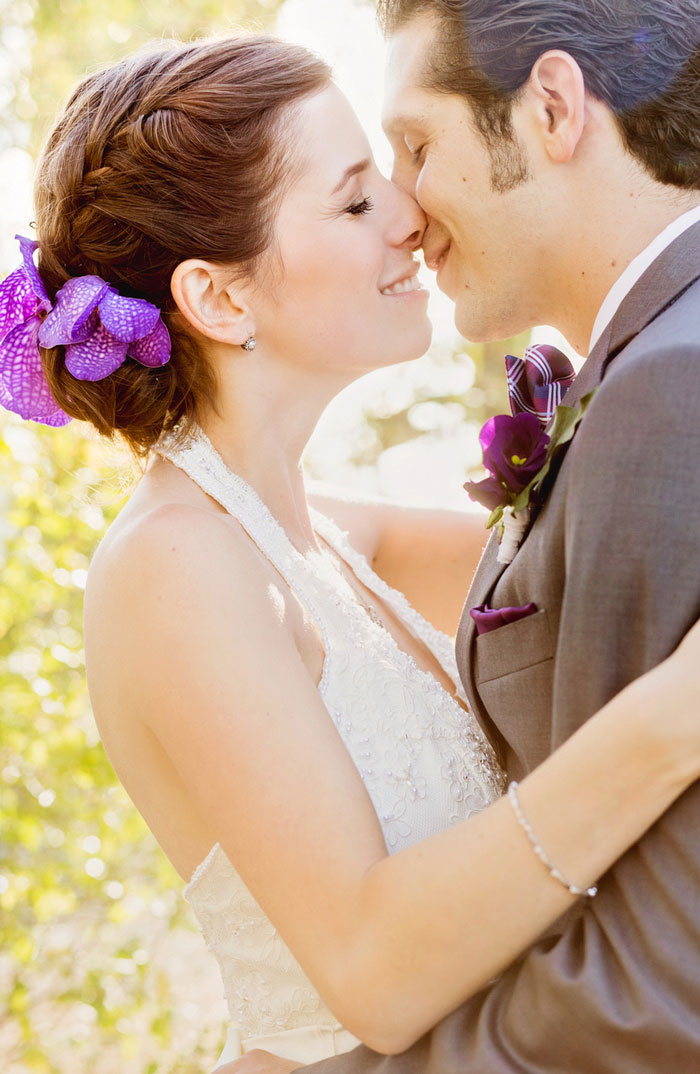 bride and groom about to kiss