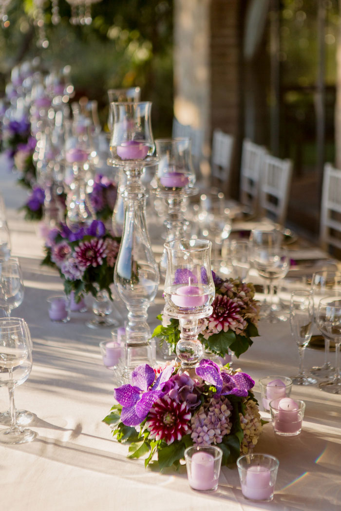 wedding tablescape with purple flowers