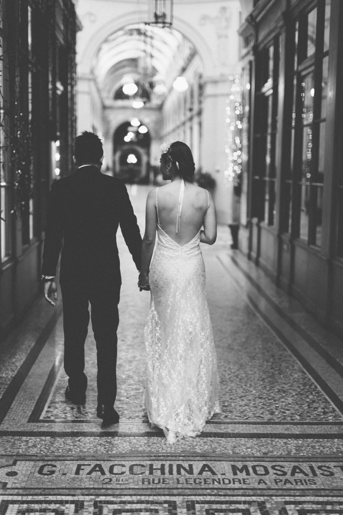 bride and groom walking in Paris