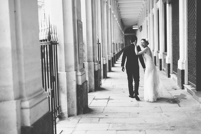 bride and groom walking in Paris